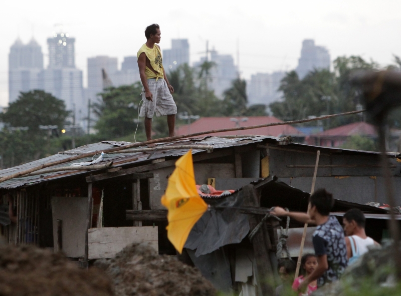 Danos no centro do Arquipélago das Filipinas após a passagem do Tufão Haiyan